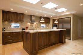 The balance of light and dark colors creates a pleasing appeal, and gives this kitchen design that classic elegance of traditional kitchens. Beauty Of Natural Walnut Mtkc Mt Kitchen Cabinets Inc San Mateo California