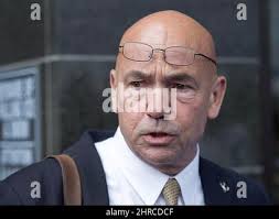 In this Thursday, June 1, 2017, image taken from video by KDFW-FOX 4, a  first responder checks out the scene after the driver of a pickup truck  crashed into the bedroom of