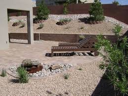 Steel sculptures, yard torches, birdfeeders, and luminaries in botanical shapes. Southwest Landscaping Ideas Lawnless Backyard Desert Backyardsouthwestern Landscapingwater Desert Backyard Arizona Backyard Landscaping Backyard Landscaping
