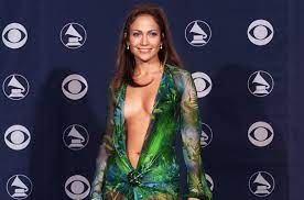 Vogue reports that the singer and actress strutted down the red carpet while her hit love don't cost a thing played, and then did another victory lap alongside. J Lo S 2000 Grammy Dress The First Viral Dress Billboard Billboard