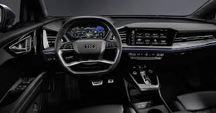 Audi's crossover and suv lineup is already mighty stout, but that isn't stopping the four rings from update 5/22/2019: Audi Q4 E Tron Has Neat New Cup Holders And Ar On The Windshield Trendy Voice