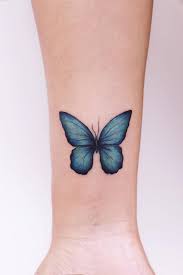 Beautiful And Meaningful Butterfly Tattoo Guide Blue Butterfly Tattoo Butterfly Tattoos On Arm Butterfly Tattoo Designs