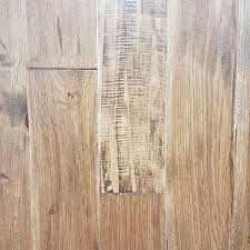 Today's hand scraped floors represent the look of a craftsmen's countless hours creating a masterpiece with scrapers and hand tools. Prefinished Vintage Hickory Saddle 4 1 4 Hand Scraped Hardwood Flooring Panel Town Floors