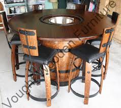 Wine Barrel Bistro Table Wine Barrel Bistro Table With A Ice Bucket In It 6 Stools Paint Whiskey Barrel Furniture Wine Barrel Furniture Wine Barrel Table