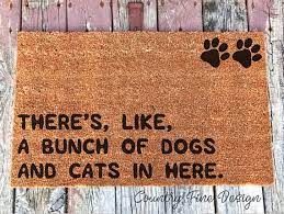 There S Like A Bunch Of Dogs And Cats In Here Doormat Cat Door Mat Quirky Home Decor Christmas Decorations For The Home