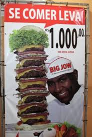 Resultado de imagem para homem comendo hamburguer