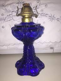 71 results for cobalt blue oil lamp. Vintage Antique Coolidge Drape Cobalt Blue Kerosene Oil Lamp Eagle Burner Oil Lamps Kerosene Vintage Antiques