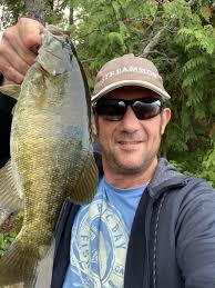 BB under the sea Went snorkeling today and saw many fish. These are two of  the biggest. Largemouth Bass.