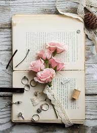 Which flowers mean love, hope, healing, and good luck? Roses On A Book Book Wallpaper Book Flowers Book Aesthetic