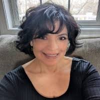 Dr. Elena Flores-Noel