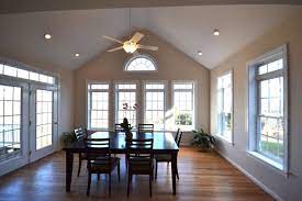 While most ceiling lighting works well for a flat ceiling, the majority of lighting can be used with a vaulted ceiling provided that you pair them with the right adaptors. Nice And Light Vaulted Room Vaulted Ceiling Living Room Recessed Lighting Living Room Living Room Ceiling