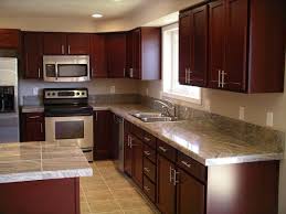 1000 Ideas About Rustic Cherry Cabinets On Pinterest Farmhouse Regarding Kitchen Backspla Painting Kitchen Countertops Kitchen Design Diy Kitchen Renovation