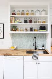 How To Grout A Tile Backsplash Like A Pro Kitchen Remodeling Projects Colonial Kitchen Remodel Simple Kitchen Remodel
