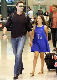 Hugh jackman shared an adorable throwback instagram for his 25th wedding anniversary. Hugh Jackman Arrives In Sydney With Wife Deborah Lee Furness And Daughter Ava Daily Mail Online