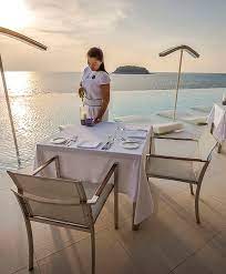 The Oceanfront Restaurant And Bar At Kata Rocks Has Stunning Sunset Views Over The Andaman Sea Making Is One Of Phuket S Premier Phuket Sunset Views Oceanfront