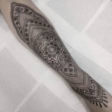 Tibetan tattoos are mainly images from buddhist thangka paintings, buddha, and other religious iconography of divine and supernatural beings accompanied by flowers and traditional background elements like clouds or water make for a stunning tattoo. Kamila Daisy Tattoo Artist Book Now Tattoodo
