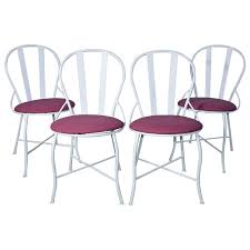 four vintage metal garden dining chairs
