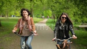 25.56k 64% two sisters enjoy 1 college bull 6:52 hd. Two Beautiful Brunettes Are Riding On The Bikes One After Another In The City Park In Spring Cute Young Women In Jeans Stock Video Video Of Action Casual 93904327