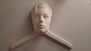 Antique wooden statue with woman's head