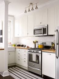 Check out these seven cool tips on how to make your tiny kitchen look bigger. 6 Easy Ways To Make Your Small Kitchen Look Bigger