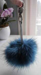 As a crochet artist, i am constantly working with yarn and exploring different ways to use it. How To Make A Faux Fur Pom Pom Keychain Diy Tutorial The Creative Curator