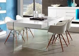 The kitchenette set includes a gas stove, water outlet, kitchen utensils, cooking pot, food. Modern German Furniture Germania Modern Cube Matt White Dining Table With Glass Legs Contemporary Dining Table Dining Table Interior Design Dining