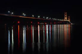 What causes the northern lights in mackinaw city? Mackinac Bridge At Night In Northern Michigan Usa Stock Image Image Of Peninsula Peaceful 39469575