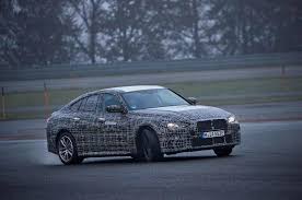 More information about the bmw i4 will emerge soon, and we expect to see the i4 in showrooms for the 2022 model year. New Bmw I4 Ev S Benchmark Handling Detailed In New Video Autocar