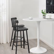 Classic wooden chairs, chairs with upholstered seats and high backs, and chairs with rounded backs. Docksta Bar Table White White Ikea In 2021 Bar Table Pub Furniture High Top Bar Table