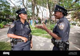 Black police woman uniform hi-res stock photography and images - Alamy