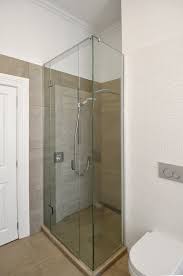 If your bathroom only has a shower stall consider not only a glass door but partially taking out another wall replacing it with glass. Inline Shower Metro Performance Glass New Zealand