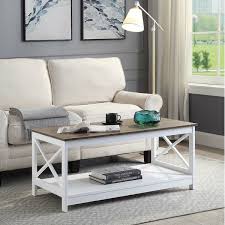 Use an ottoman instead of a coffee table in the living room interior design trend. Beach Coastal Coffee Table Wayfair