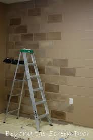 How To Paint A Concrete Wall To Look Like Stone Sonya Hamilton Designs Home Diy Cinder Block Walls Concrete Block Walls
