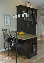 Transitional kitchen cabinets can be more traditional cabinet designs with modern hardware, or a kitchen with modern shaker cabinets as well as a more traditional open frame display cabinet. China Cabinet Hack To Kitchen Island And Pantry Interior Frugalista