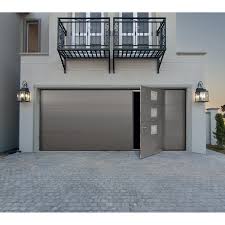 Neo10.com dispose d'une large gamme de portes de garage basculantes avec portillon intégré standards, qui sauront répondre à vos attentes et à vos besoins. Porte De Garage Sectionnelle Avec Portillon Portes De Garage Storistes De France