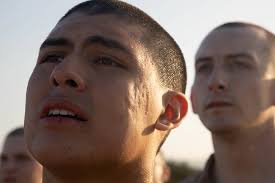 U.S. Marine Corps Recruit Maximiliano Sanchez, a native of Santa Clarita,  California, with Delta Company, 1st Recruit Training Battalion, listens to  instructions during the Obstacle Course event at Marine Corps Recruit Depot