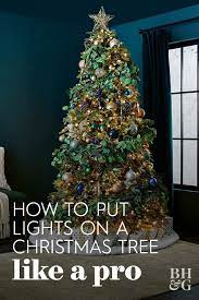 This Vertical Christmas Tree Lighting Hack Is The Easiest Way To Decorate Your Tree Christmas Tree Lighting Diy Christmas Tree Ornaments Diy Christmas Wall