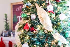 Regular christmas balls work great for mesh wreaths. Diy Christmas Tree Decorating With Deco Mesh Modern Mom Life