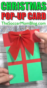 These pop up cards are simple and easy to create. Christmas Present Photo Pop Up Card With Video Video Video Christmas Gift Videos Christmas Cards Kids Diy Christmas Cards