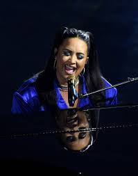 Demi lovato just finished giving one of the most significant and powerful performances of her career at the grammys tonight. Demi Lovato Purple Suit At Billboard Music Awards 2020 Popsugar Fashion