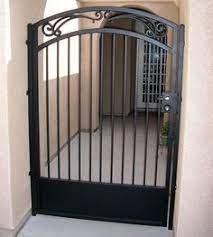This front walkway and porch is uncovered, but shaded by the tall, thick trees surrounding. 9 Front Porch Enclosure Gates Ideas Porch Enclosures Gate Design Iron Gates