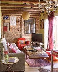 Living Room With Rough Brick Walls And Wooden Beams On The Roof Makes The Atmosphere Becomes Warmer Bohemian Living Rooms Home Decor Bohemian Interior Design