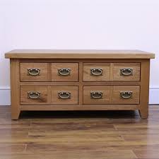 The storage drawers can hold living room items and help keep your space organized. Oban 4 Drawer Coffee Table Glenross Furniture