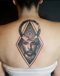 In fact, you've probably already used or received it in a text or an email. 20 Stunning Back Tattoo Designs Ideas The Xo Factor