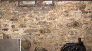 While stone basement walls provide a rustic charm, they may need painting to enhance the appearance of your basement or provide a barrier of protection from moisture damage. Old Stone Foundation Advice Stone Foundation Foundation Repair Old Stone Houses