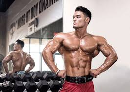 fil am olympia champ jeremy buendia sets the bar high for