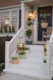 Unlike most houses which sport a regular small porch area, with room for just a couple of chairs. Front Porch Ideas And Designing The Outdoors Nesting With Grace Front Porch Steps Front Porch Design Porch Design