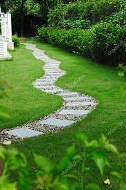 Garden Stone Path With Grass Growing Up Between The Stones Stone Garden Paths Garden Pathway Landscape Design