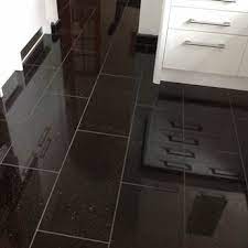 This floor was polished granite and was black star galaxy. Black Star Galaxy Sparkling Granite Floor Wall Tile