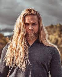 Try running some gel through the top of your hair and slicking it back into a little rolled chignon. 52 Stylish Long Hairstyles For Men Updated July 2021